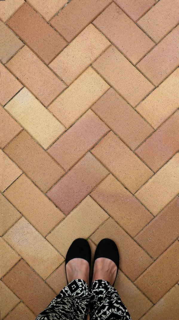 How to Integrate a Herringbone Vest into a Winter Work Outfit for an Extra Layer of Warmth?